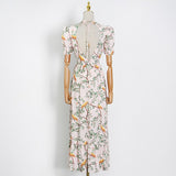 The Floral Print Backless Dress