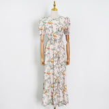 The Floral Print Backless Dress